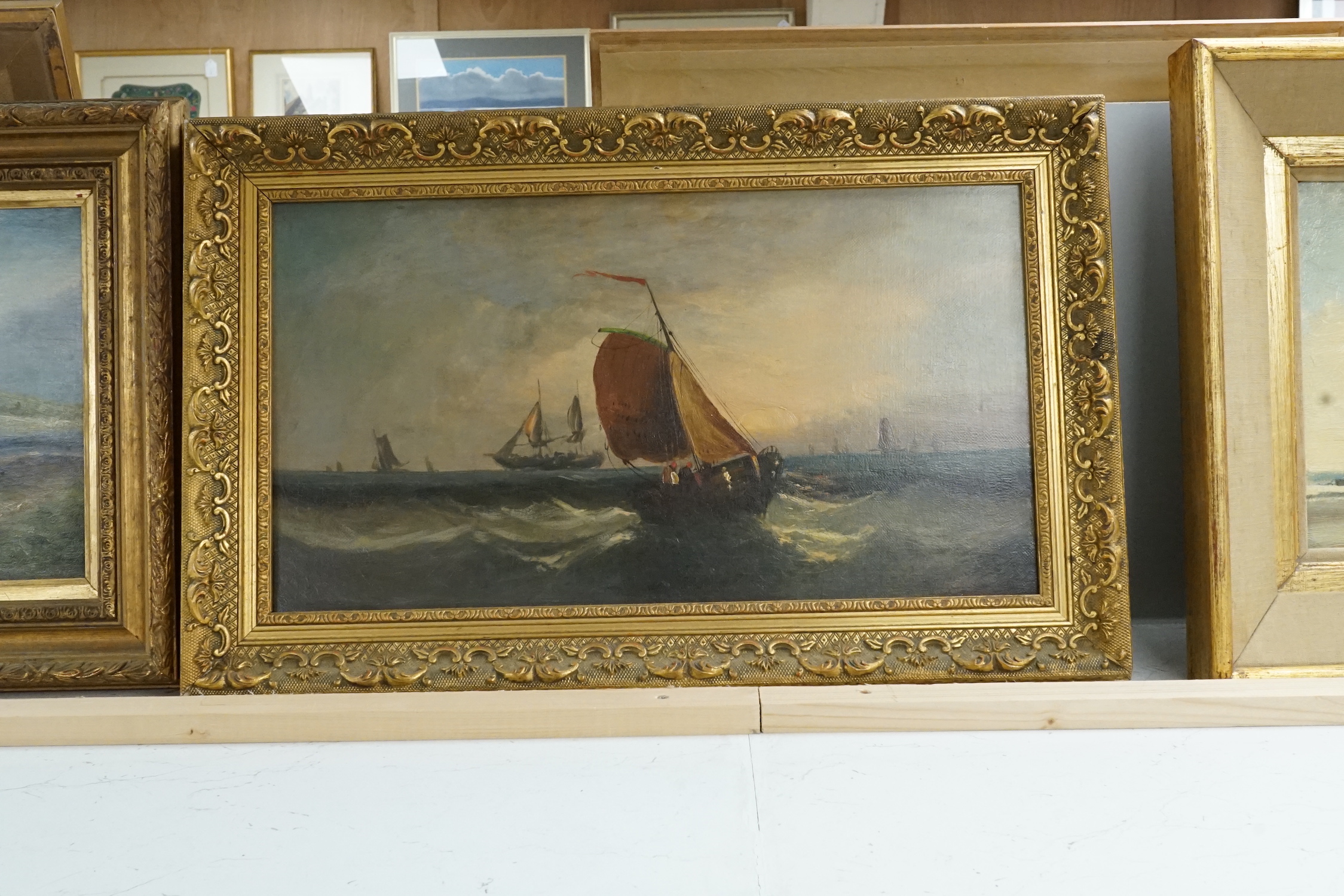 After William Henry Williamson (1820-1883), two oils on canvas, Fishing boats at sea, indistinctly signed, 24 x 44.5cm and 22 x 44.5cm, frames differ